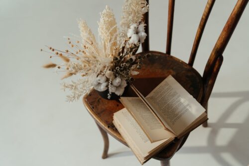 white book page on brown wooden table